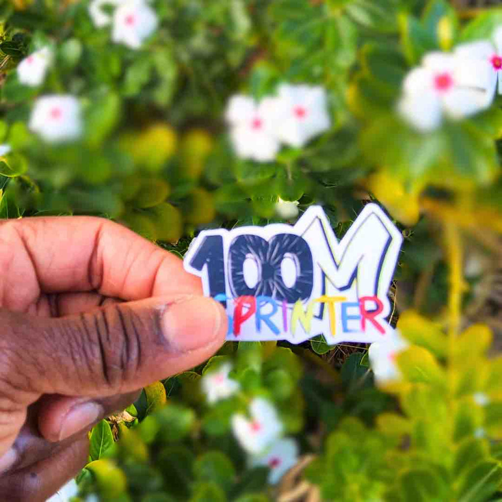 This '100M Sprinter' sticker design has a graffiti-style font. The number '100' is in black with a dynamic, speed-inspired effect, while the 'M' is outlined in black with a neon green highlight. 'SPRINTER' is written in vibrant, multicolored letters, adding an energetic and sporty feel.