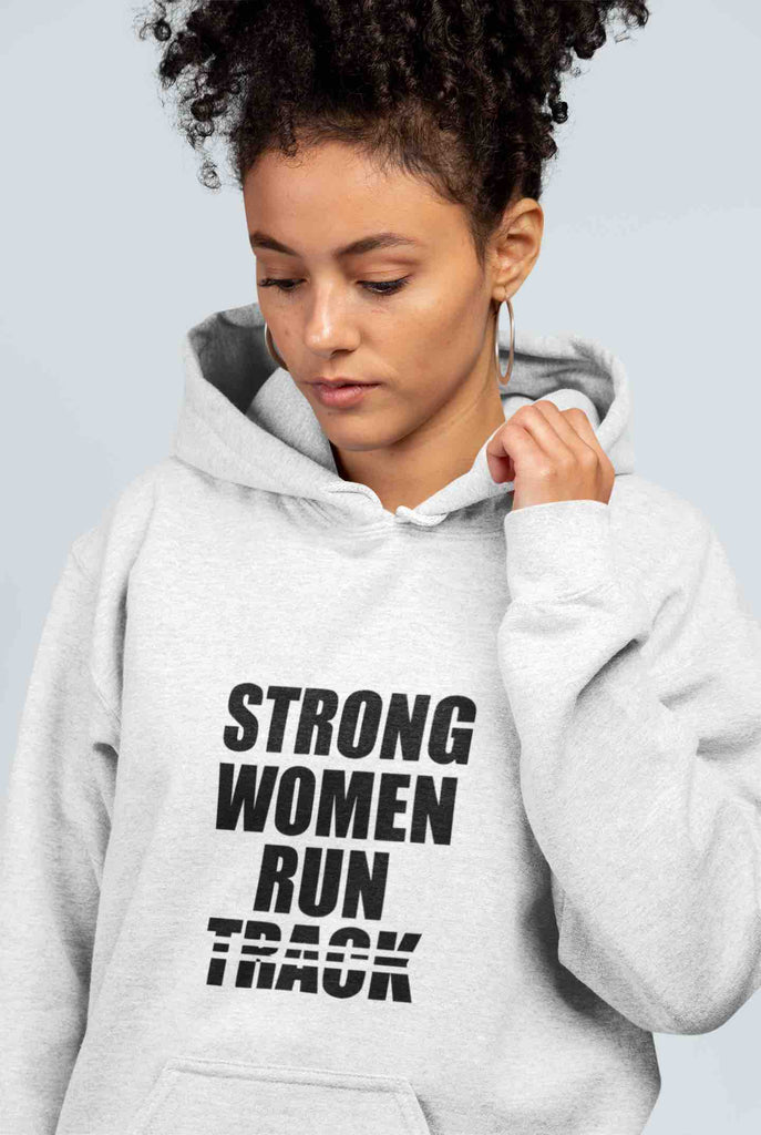 This is an image of a gray hoodie with a bold black print of the words 'Strong Women Run Track' on it. It's a gift that inspires, motivates, and celebrates the incredible strength of female athletes.